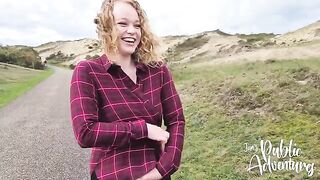 Exhibitionist beauty almost gets caught while flashing on the beach