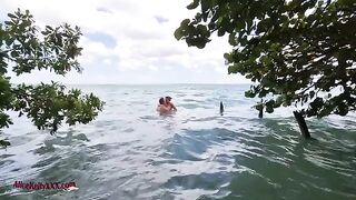 A hot girl is having sex in the blue lagoon, showcasing sensual outdoor passion