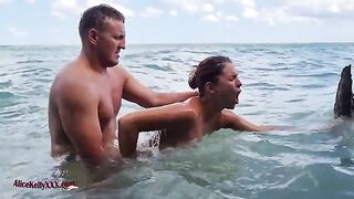 A hot girl is having sex in the blue lagoon, showcasing sensual outdoor passion