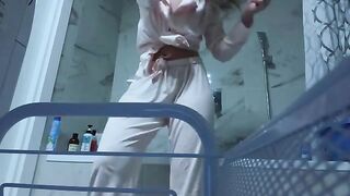 Petite girl masturbating her pussy in the bathroom alone