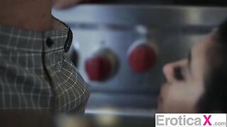 A hot couple enjoy sensual sex right in the kitchen, a typical setting for their passionate encounters