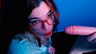 A teacher guides her student's hand to teach ASMR