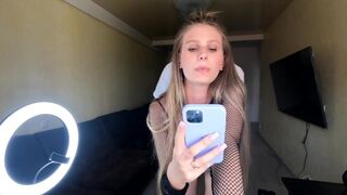 A blonde fucks on camera, showcasing her big tits and ass in an exclusive HD scene