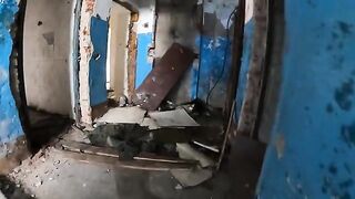 An exhibitionist girl is walking around horrible buildings with her sexy bbe