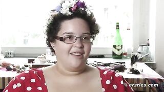 An amateur girl caresses her shaved pussy with her fingers in a sensual Ersties video