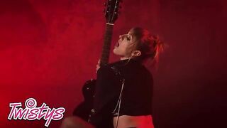 Angel Youngs in red lingerie for a sensual solo performance