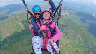 Real squirting action while paragliding in 2200 m above the sea (7000 feet)