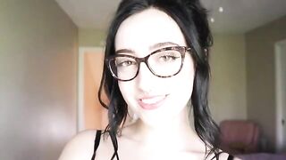The girl is reading a funny book and she doesn't want to cum