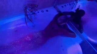 The blonde plays with sex toys in the bathroom