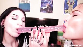 Lesbian beauties fuck each other with a double-ended dildo