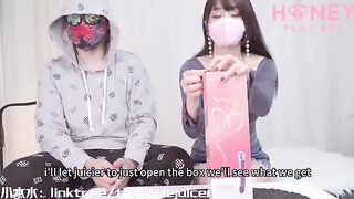 The Asian woman has long known what to do with her new friend