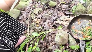 A hot single mom was seen cooking and getting intimate with someone in the woods