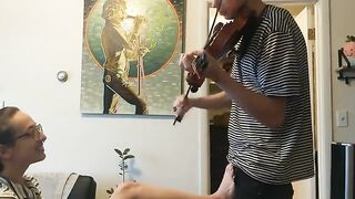 The couple was trying to practice violin when things got steamy