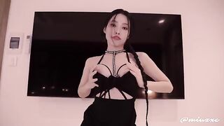 Asian in black dress moaned and squirted, a steamy scene