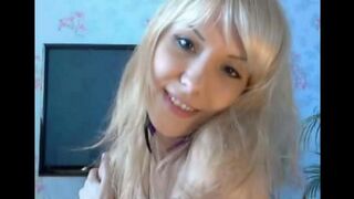 Blonde beauty caresses her pussy with fingers in a steamy solo session