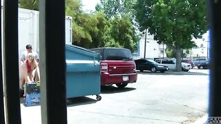 A couple got intimate behind the garbage tank, unnoticed