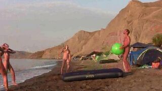 A naked game of badminton on a nude beach is the best way to keep fit