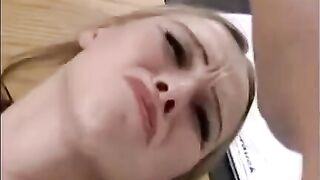 A girl is having fun with a hand and a member at the same time