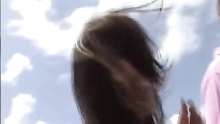The young girl practices her tongue skills with her shaggy