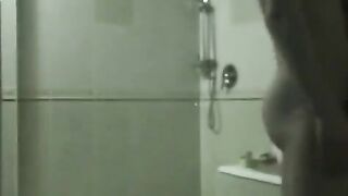A drunken brunette has sex in the bath with her friend