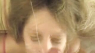 A cum shot on the girl's face after a nice blowjob