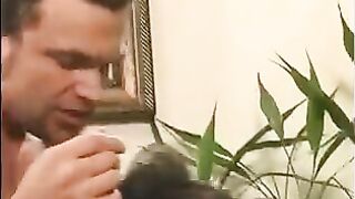 A 40-year-old guy playing a joke with touching girl’s tits