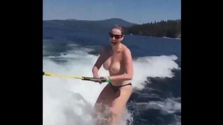 Topless girl water skiing is an awesome thing
