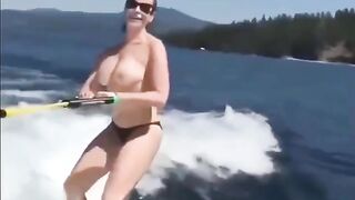Topless girl water skiing is an awesome thing