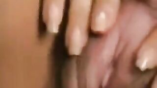 Girl with hairy pussy plays with her big clitoris