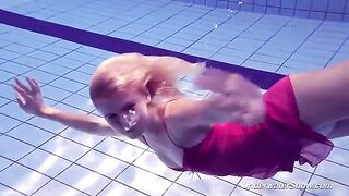 Helen has a swim in the pool without any swimming suit
