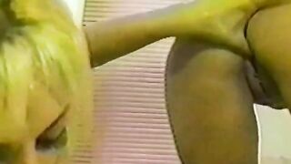 A couple of hot girls have fun in the shower with a toy