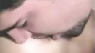 A man has sex with a strapon and a girl's hand