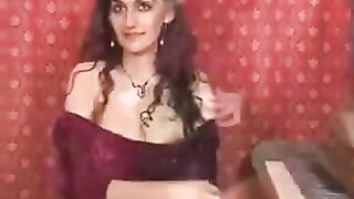 A girl plays with her hairy pussy using her fingers in a steamy session