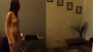 A cute Russian girl masturbates in the kitchen, all alone