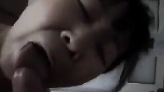 The Chinese girl practices blowjob with her man