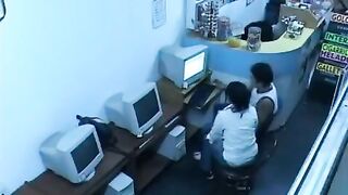 A girl was fucking in front of a webcam in the Internet cafe