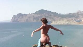 A girl is fucking on the naked beach