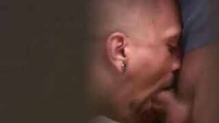 Two guys are jerking off in the public toilet