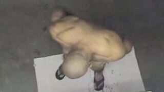 A spy camera captured a naked man in the shower, showcasing a steamy scene