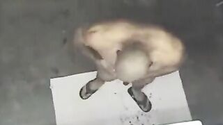 A spy camera captured a naked man in the shower, showcasing a steamy scene