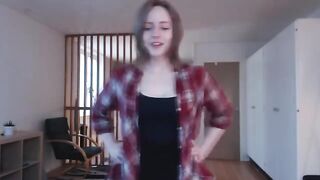 A girl plays with a big dildo, imitating sex and reaching a climax