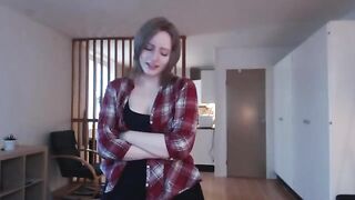 A girl plays with a big dildo, imitating sex and reaching a climax