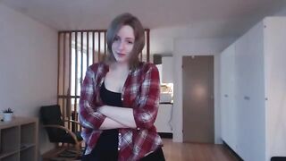 A girl plays with a big dildo, imitating sex and reaching a climax