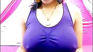 Her nipples are standing while she is excited and playing with her boobs