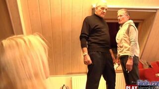 A bearded guy with gray hair fucks a young blonde in an intense scene