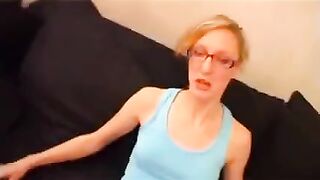 A sexy thin French girl with glasses has sex on the couch