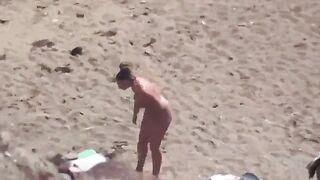 A pair of naked people at the bottom of the sea