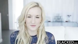 A blonde woman is fucking with a black man while using a vibrator