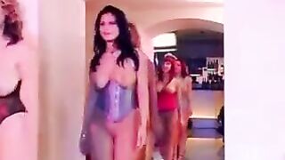 Busty milf is the centerpiece of an intense group encounter