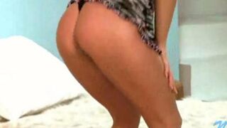 A young Russian harlot is stripping on the camera
